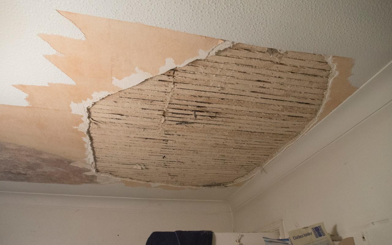 Water-damaged ceiling caused by a roof leak