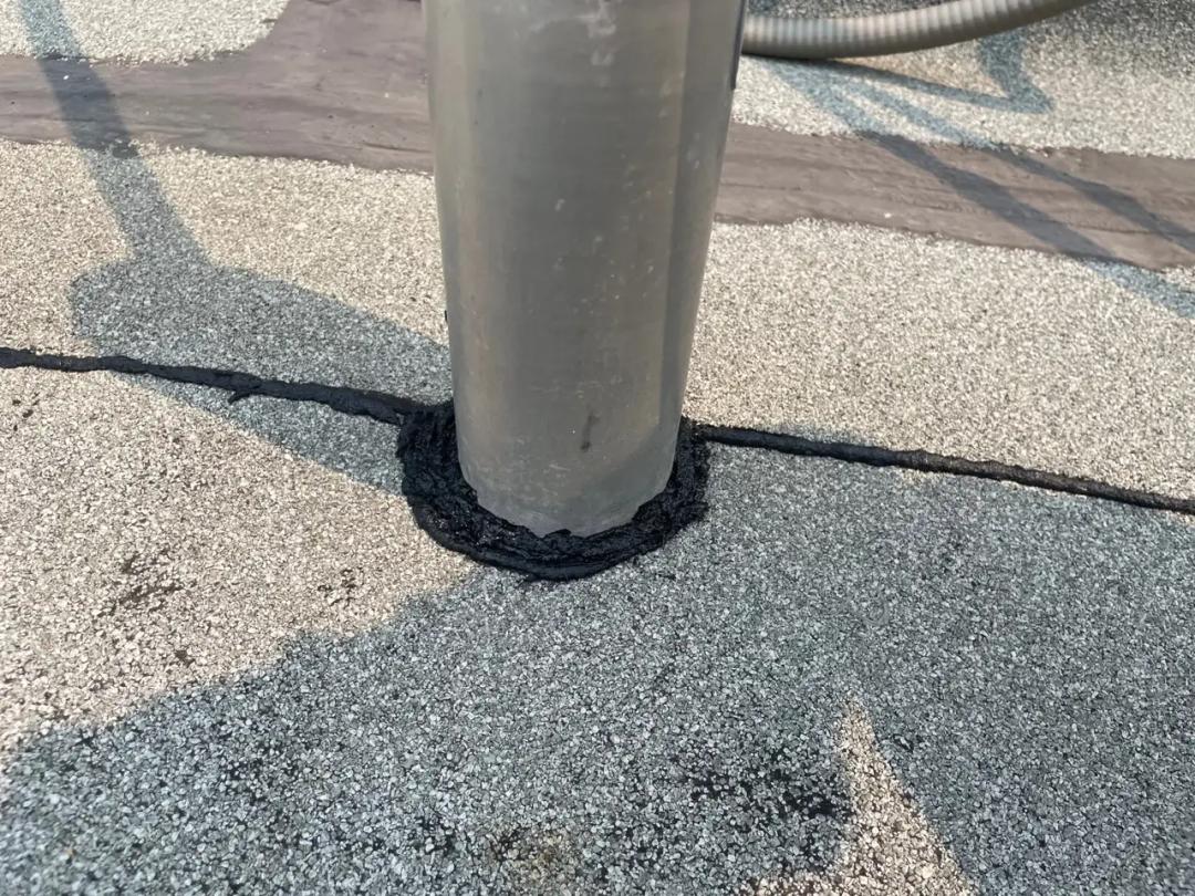 Completed leak-point repairs across the flat roof