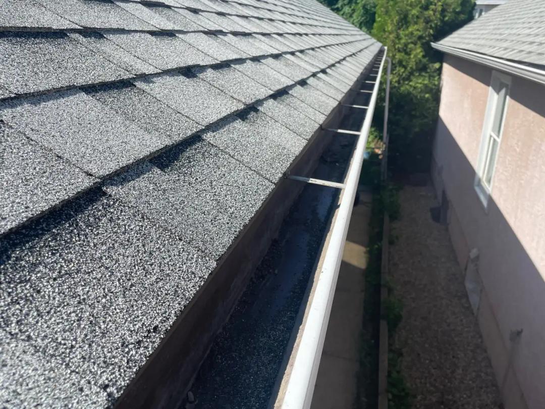 Downspout cleared and draining freely