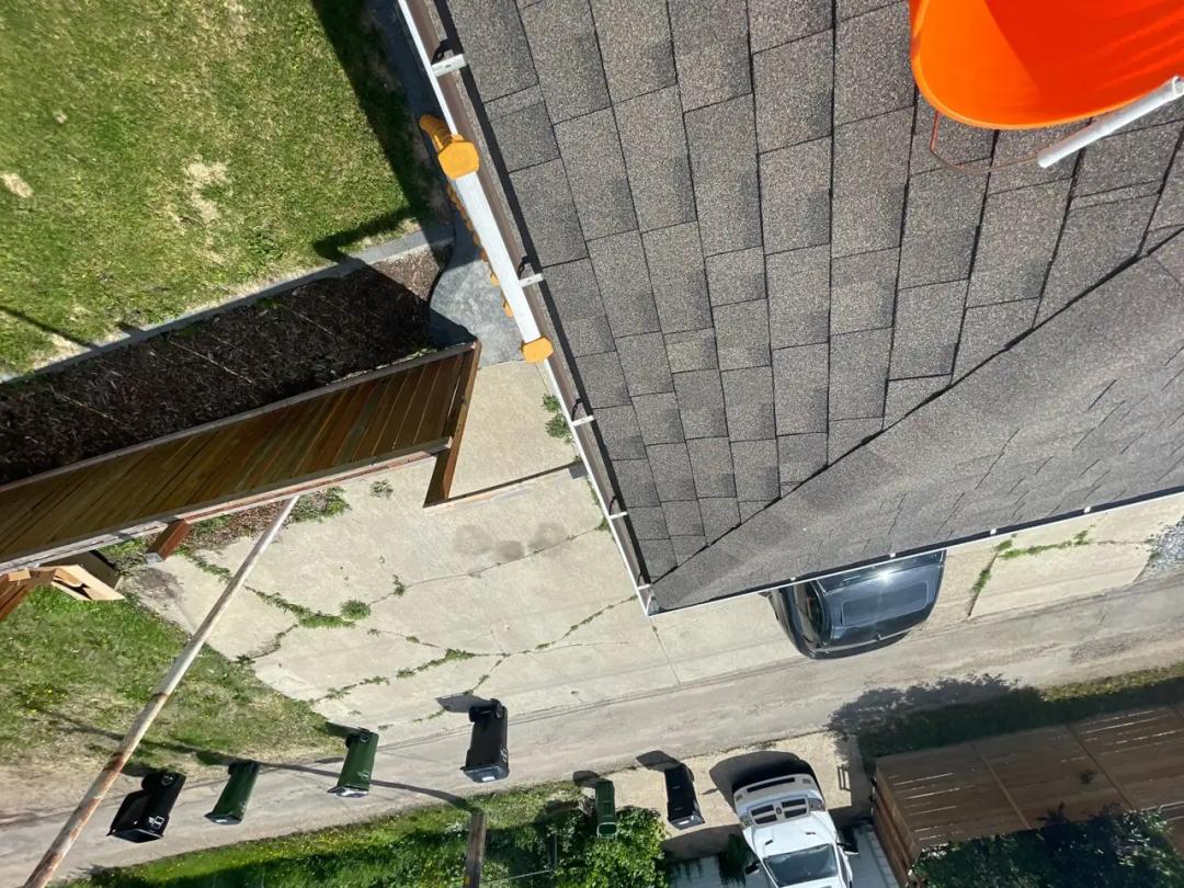 Roofline and gutters on an Edmonton home before cleaning
