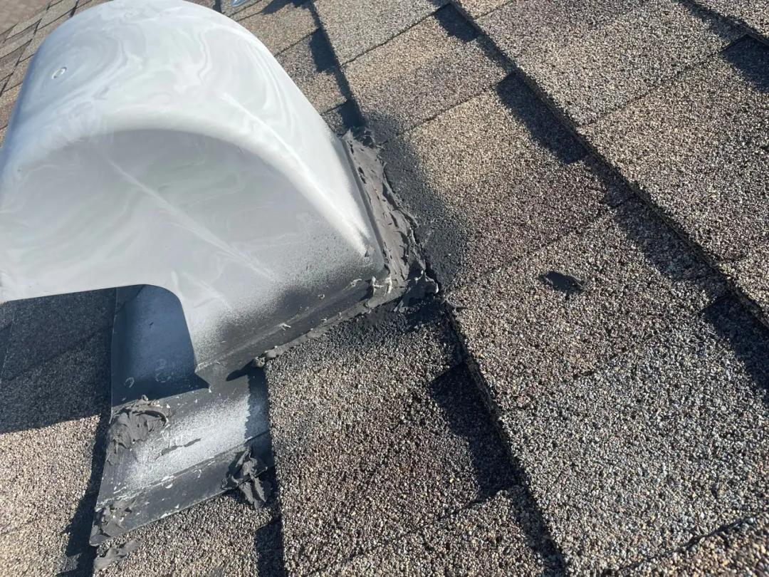 Close-up of the deteriorated, failed roof vent