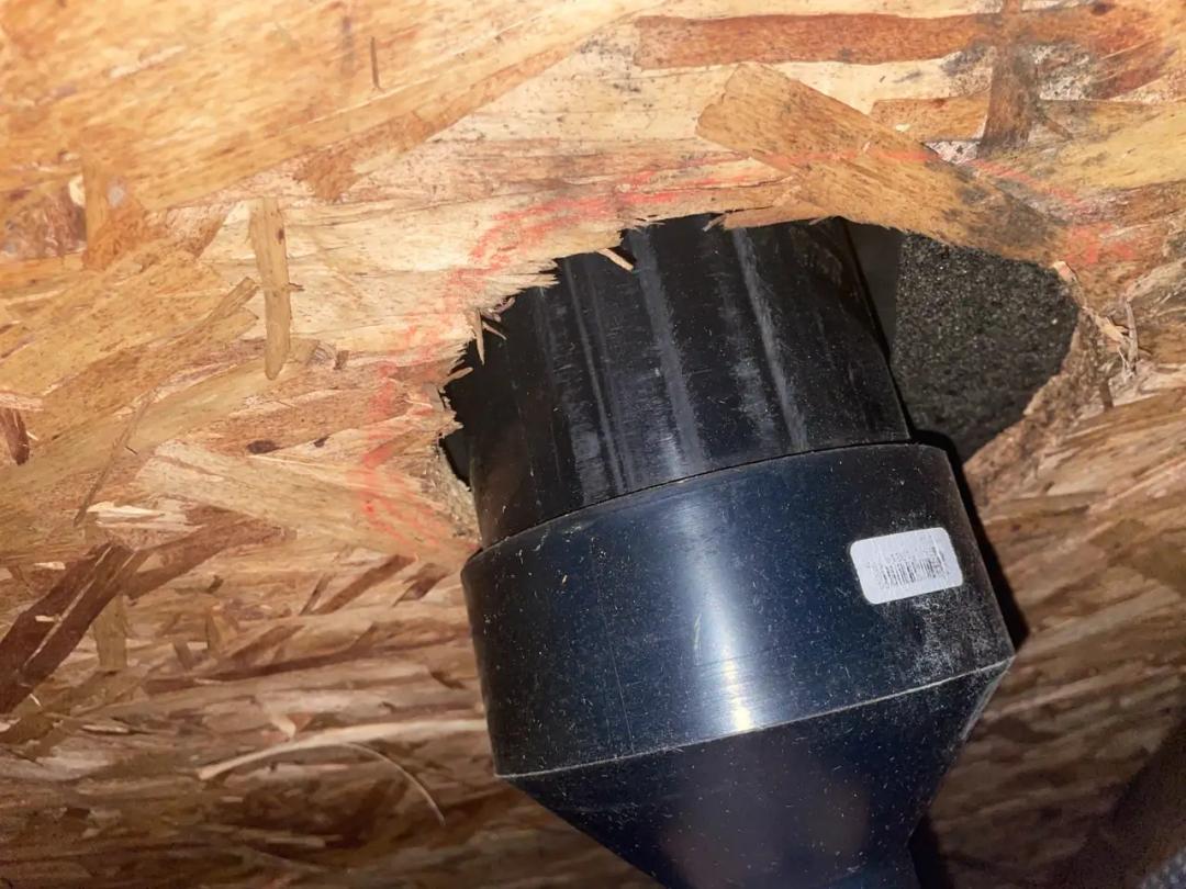 The vent pipe traced up through the attic