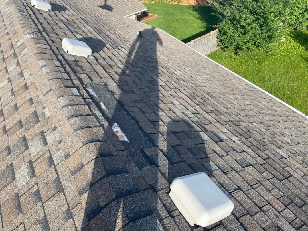 Damaged shingles removed back to a solid surface