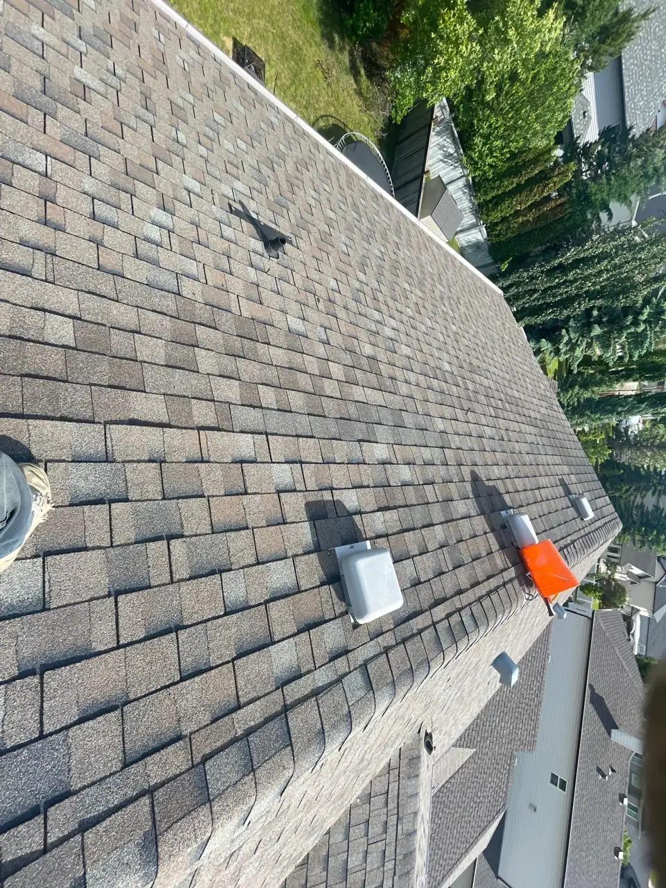 New shingles installed to match the roof