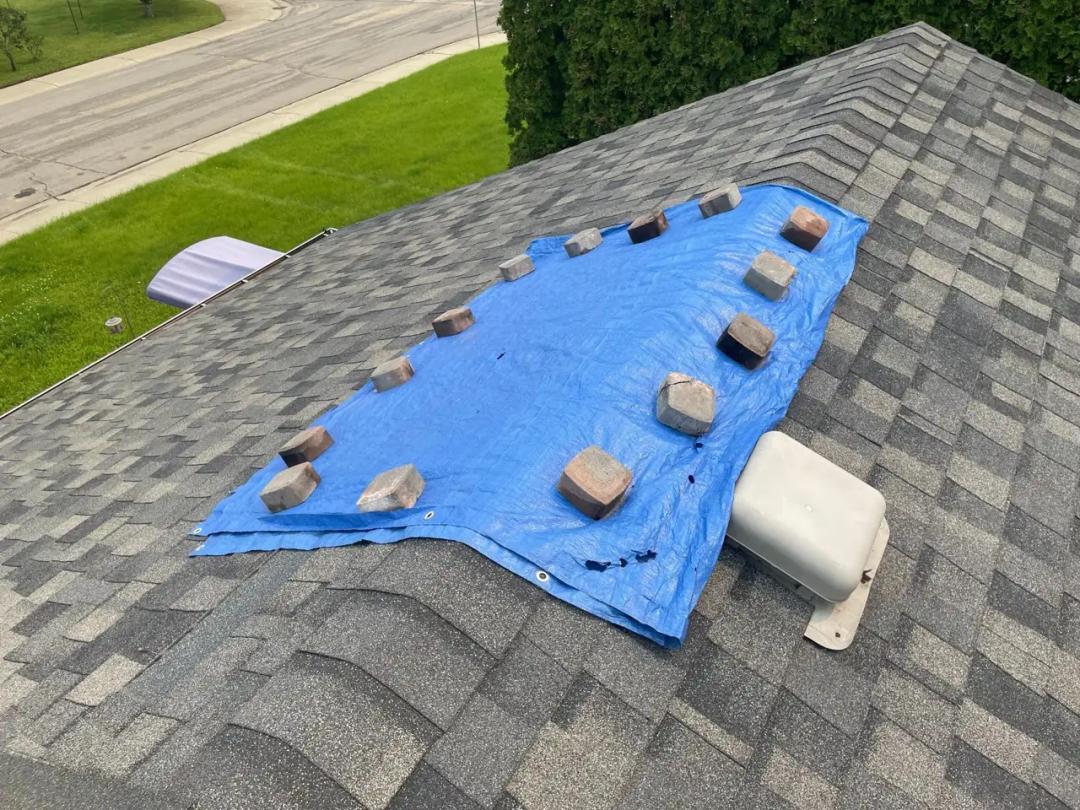 Damaged shingles removed back to a solid surface