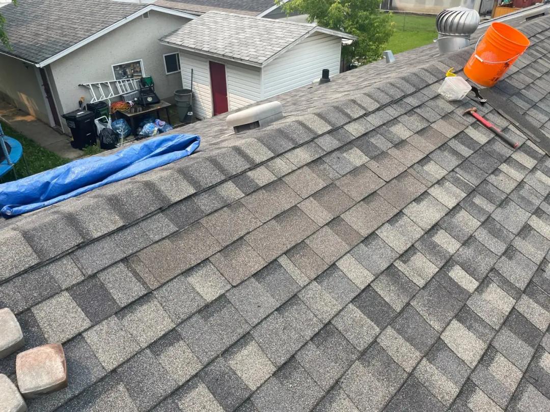 New shingles going on to match the roof