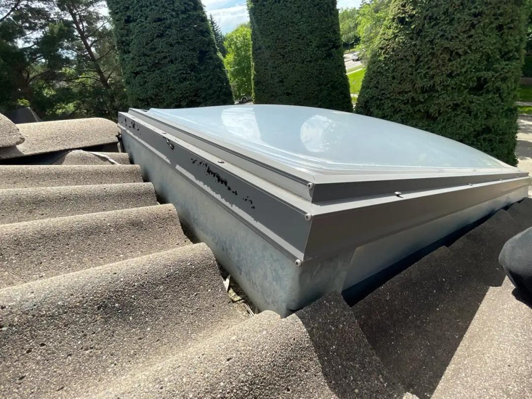 Cleaning and prepping the skylight perimeter for sealing